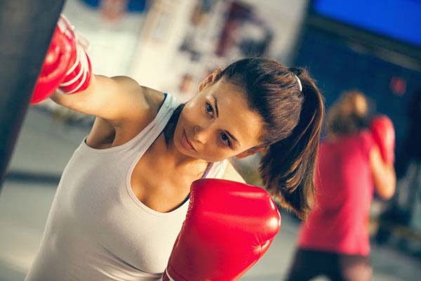 a young female practicing boxing